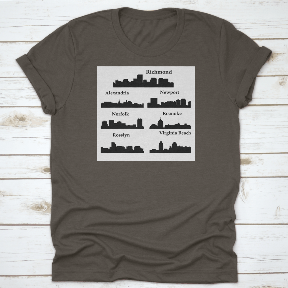 A stylish travel shirt featuring a dark inked skyline silhouette of seven cities in Virginia, made from soft cotton fabric.