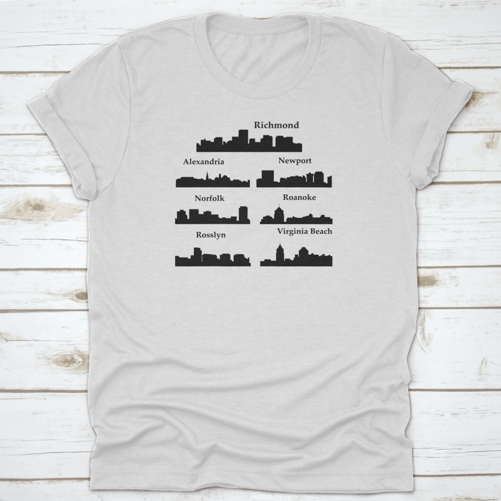 A stylish travel shirt featuring a dark inked skyline silhouette of seven cities in Virginia, made from soft cotton fabric.