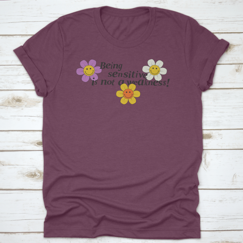 A vibrant 70s retro-inspired t-shirt featuring a smiling face and daisy print, showcasing a nostalgic design.