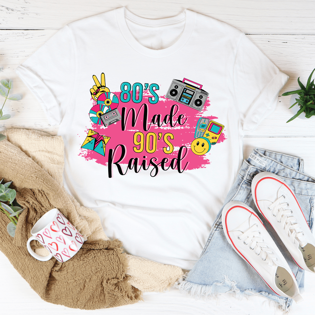 A stylish 80's Made 90's Raised T-Shirt showcasing vibrant colors and a comfortable fit, perfect for nostalgic fashion lovers.