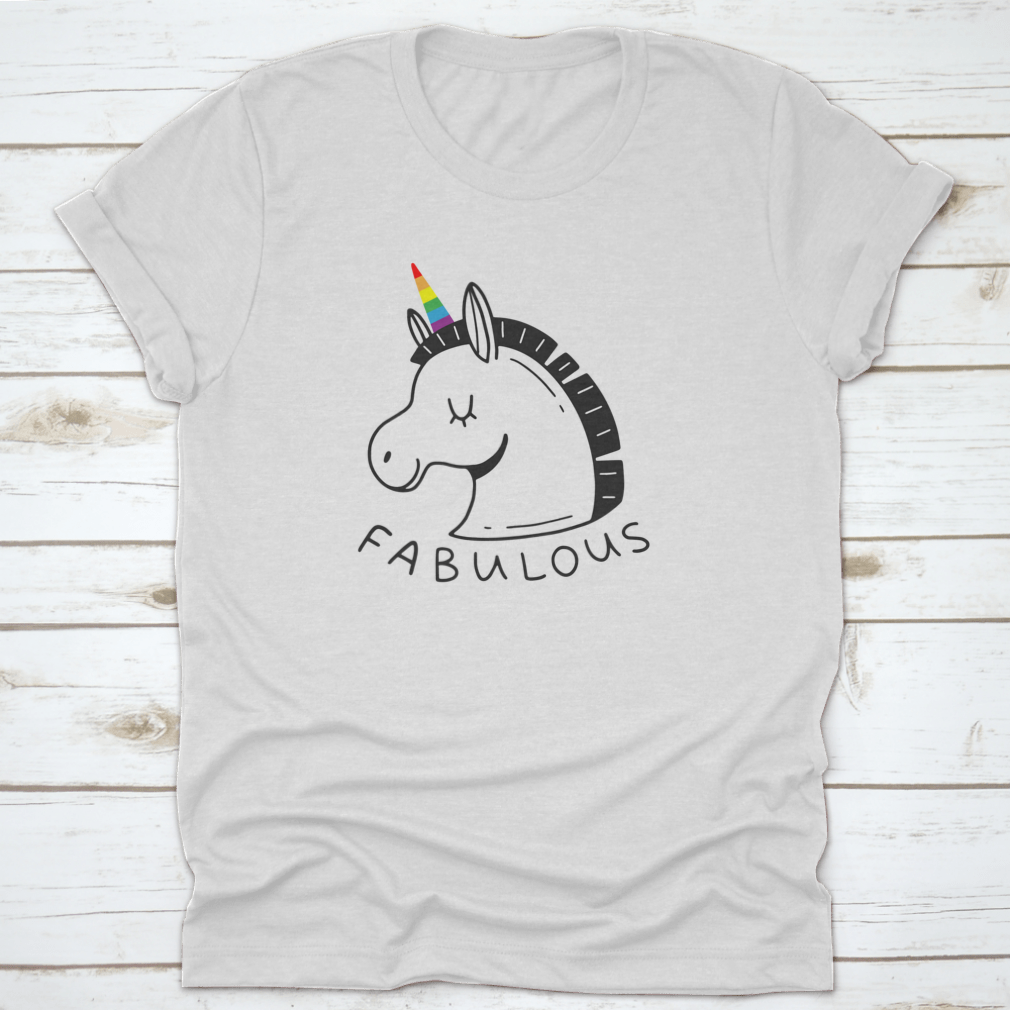 A colorful unicorn T-shirt featuring an LGBT rainbow horn and the word 'Fabulous' in a doodle style, showcasing vibrant colors and a playful design.