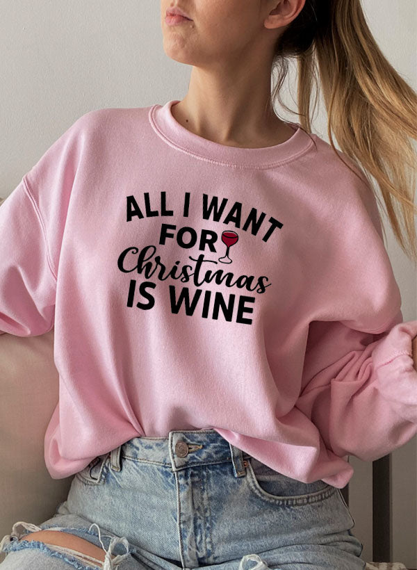 Cozy 'All I Want For Christmas Is Wine' sweatshirt featuring festive design and adjustable cuffs, perfect for winter wear.