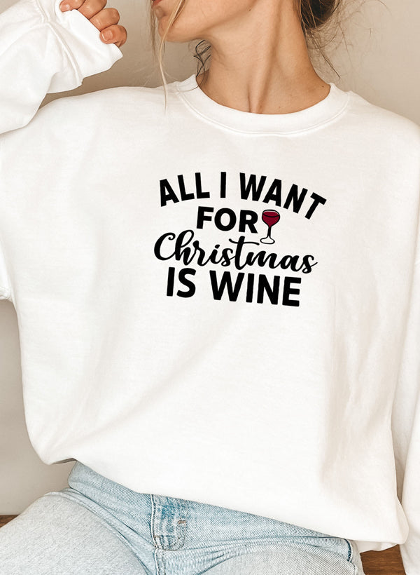 Cozy 'All I Want For Christmas Is Wine' sweatshirt featuring festive design and adjustable cuffs, perfect for winter wear.