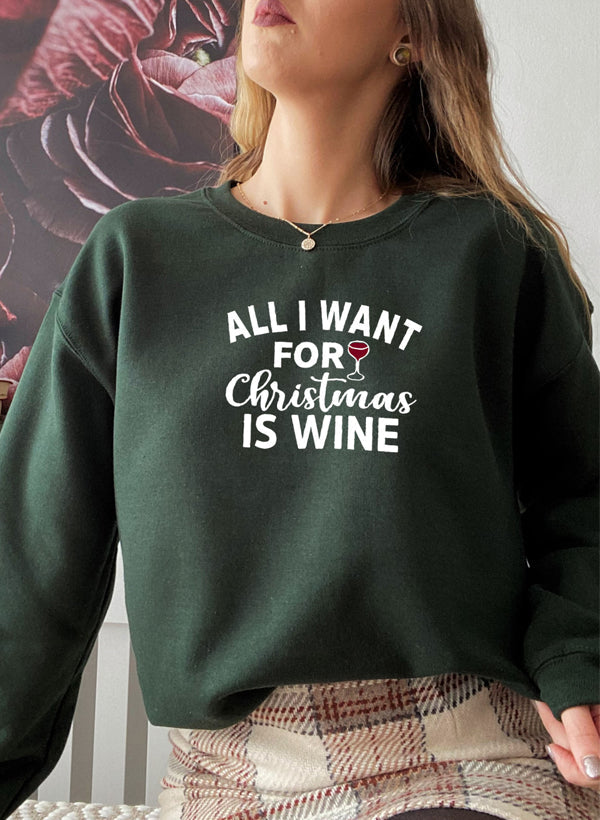 Cozy 'All I Want For Christmas Is Wine' sweatshirt featuring festive design and adjustable cuffs, perfect for winter wear.