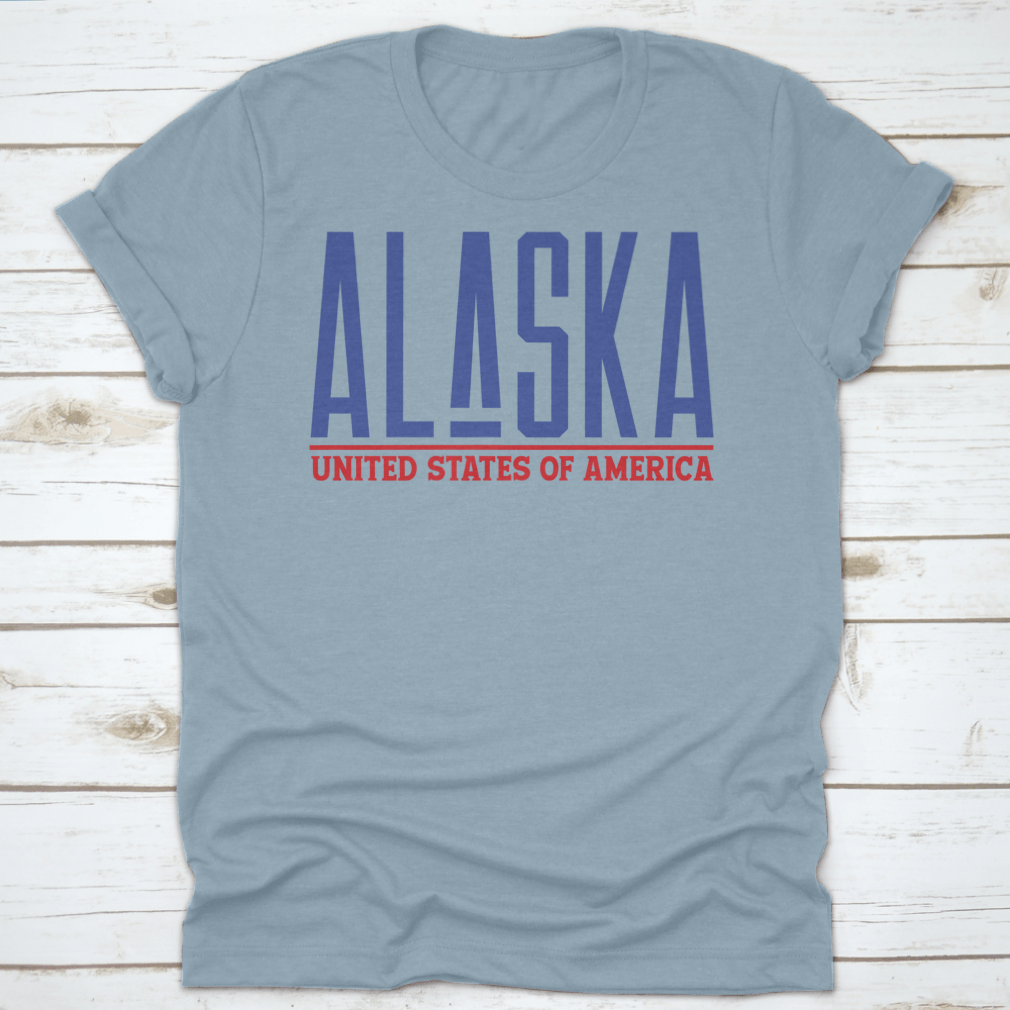 Alaska Modern Name Vector Graphic Shirt displayed on a hanger, showcasing its unique design and quality fabric.