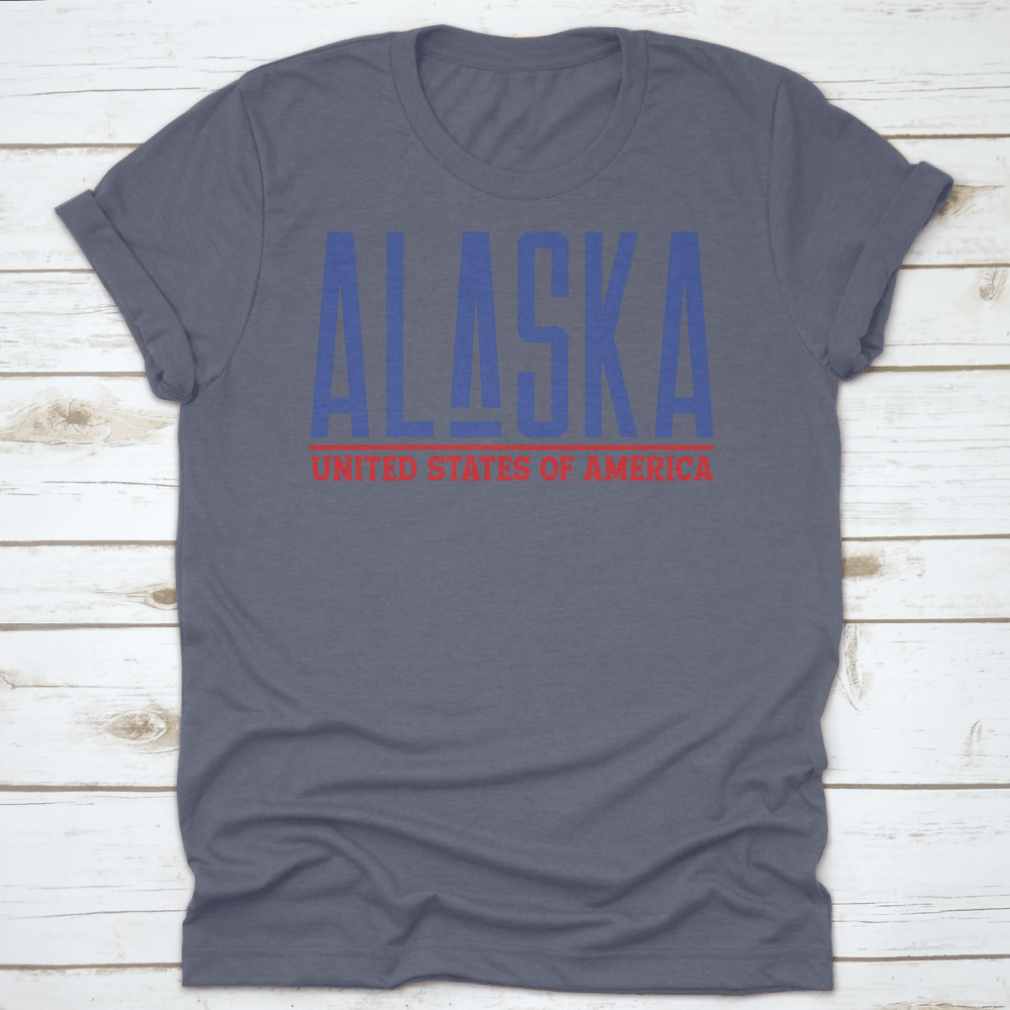 Alaska Modern Name Vector Graphic Shirt displayed on a hanger, showcasing its unique design and quality fabric.