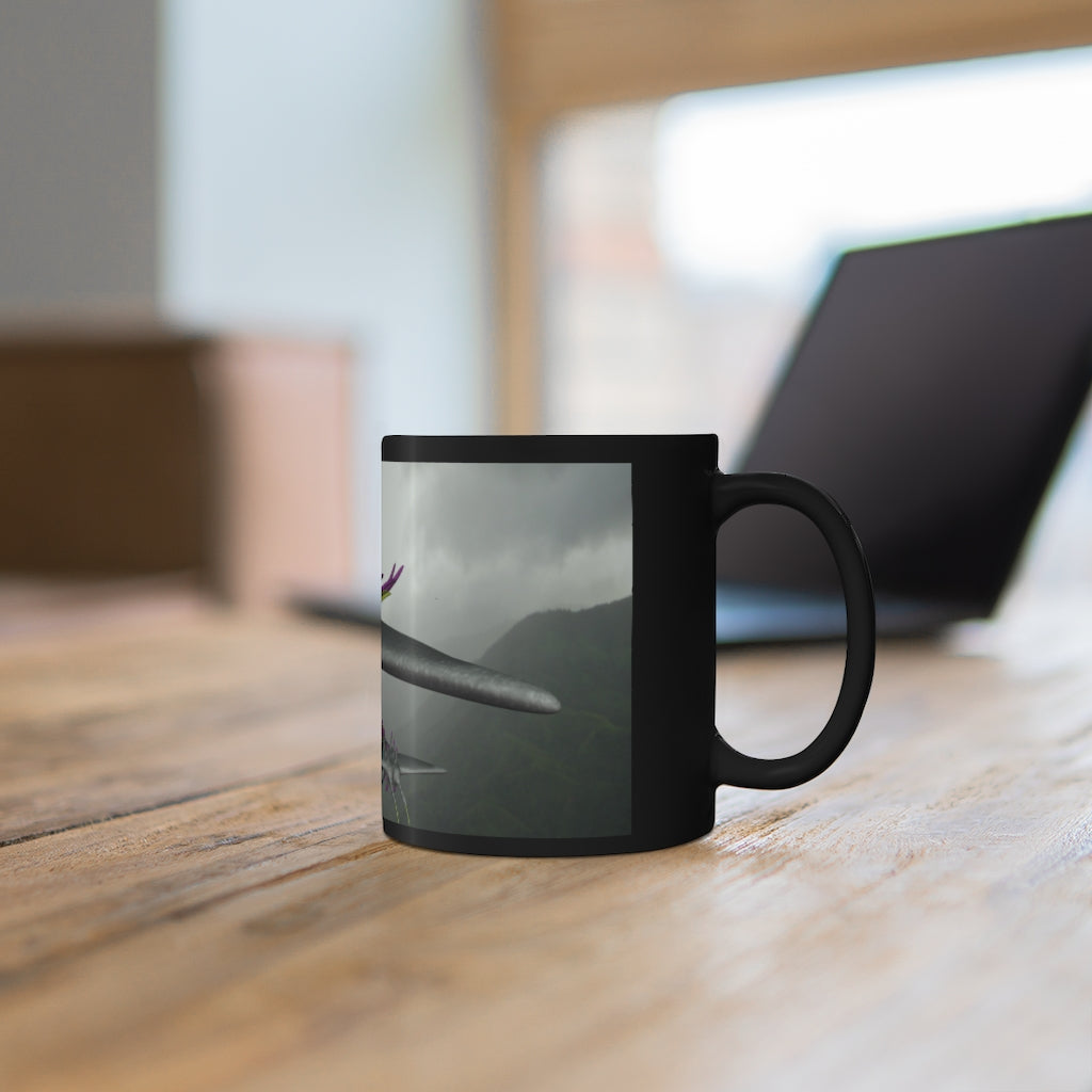 Alpha Creature Black mug, 11oz capacity, featuring a sleek black ceramic design with rounded corners and a comfortable C-handle.