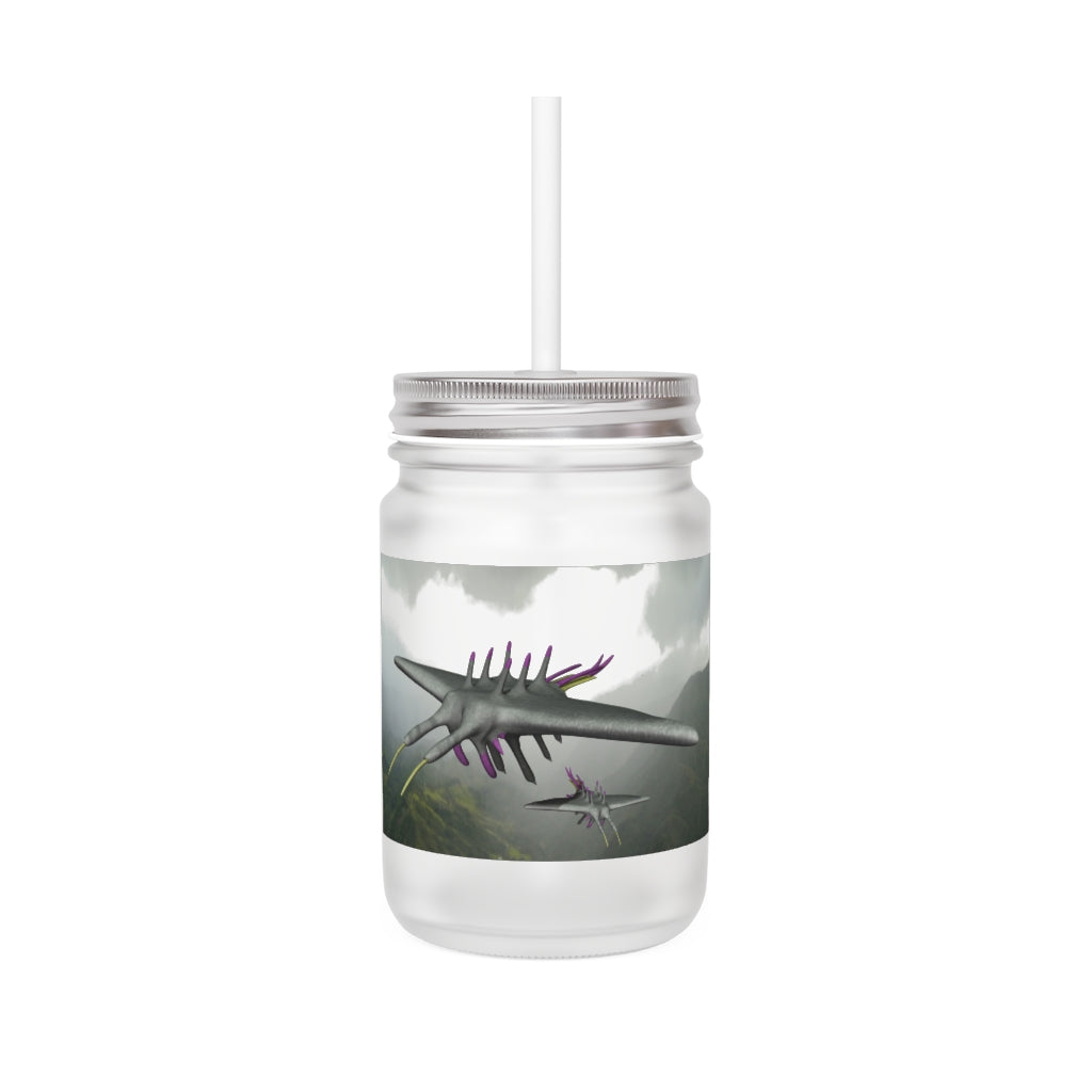 A stylish Alpha Creature Mason Jar made of frosted glass, featuring a straw and lid, perfect for personalized drinks.