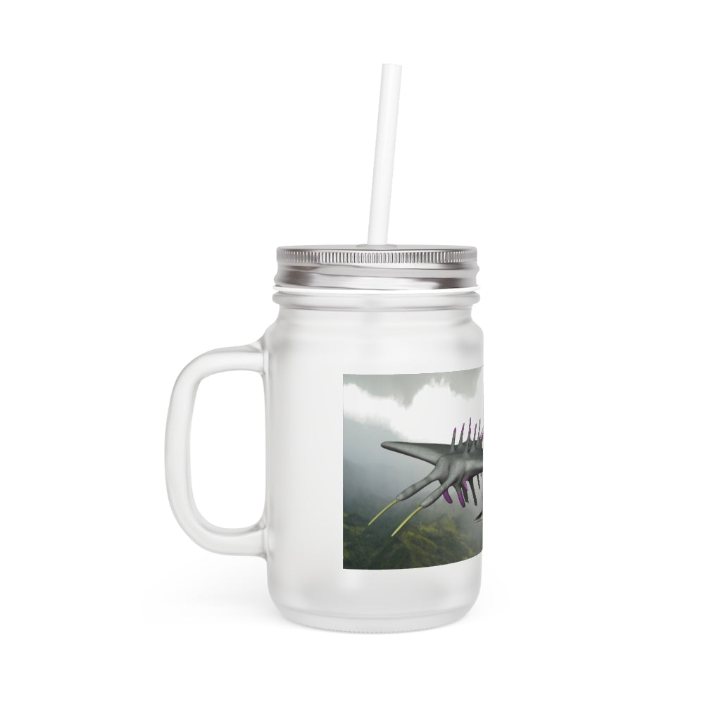 A stylish Alpha Creature Mason Jar made of frosted glass, featuring a straw and lid, perfect for personalized drinks.