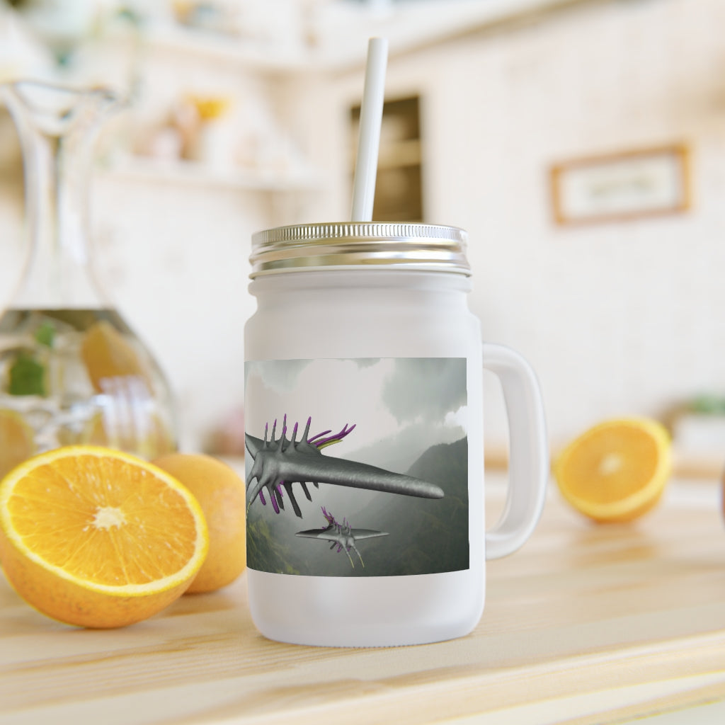 A stylish Alpha Creature Mason Jar made of frosted glass, featuring a straw and lid, perfect for personalized drinks.