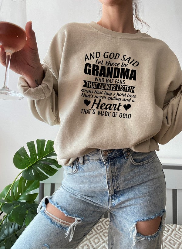 Cozy sweatshirt featuring the phrase 'And God Said Let There Be Grandma', made from a soft cotton/poly fleece blend.