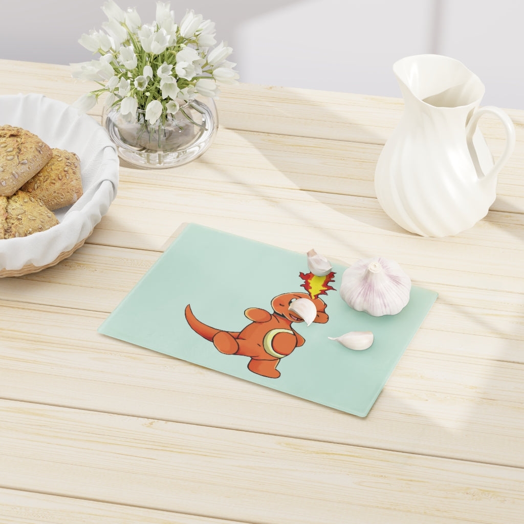 Angetapir Cutting Board made of tempered glass with rubber dots for stability, showcasing a personalized design.