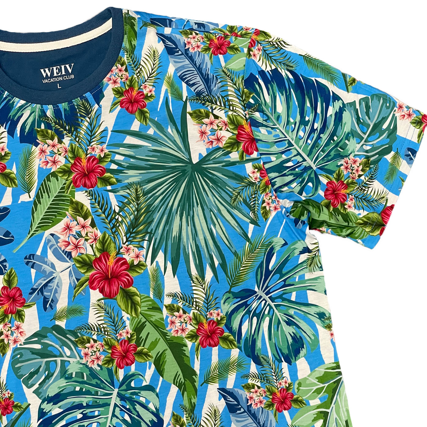 AP06 All Over Print Tropical T-shirt featuring vibrant floral designs, round neck, and short sleeves, perfect for summer wear.