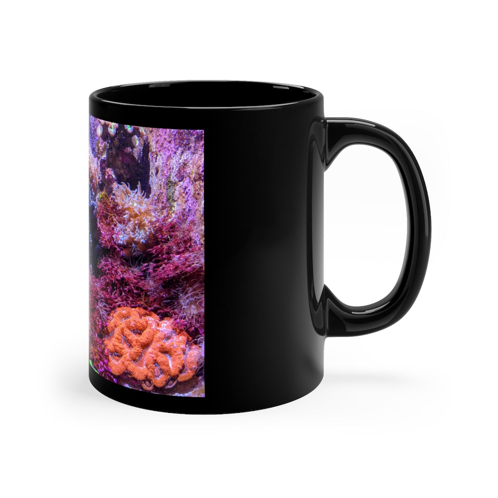 A stylish 11oz black ceramic mug with a C-handle, perfect for coffee, tea, or hot chocolate, featuring customizable designs.