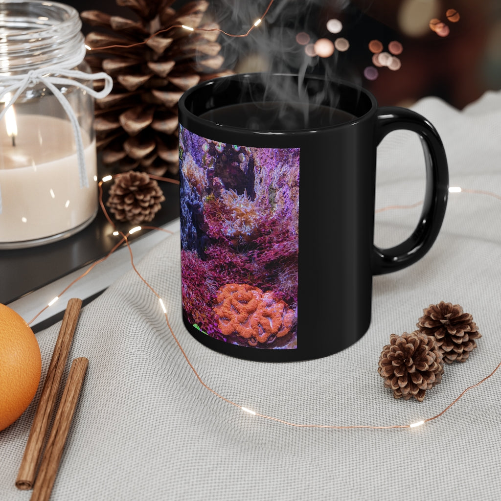 A stylish 11oz black ceramic mug with a C-handle, perfect for coffee, tea, or hot chocolate, featuring customizable designs.