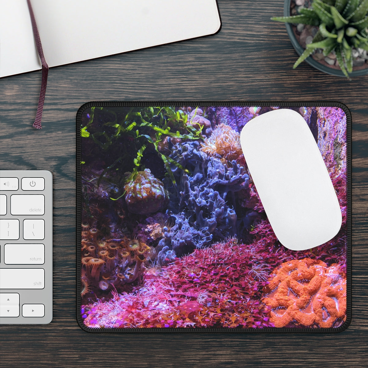 Aquarium Gaming Mouse Pad featuring vibrant aquatic designs and stitched edges for durability.