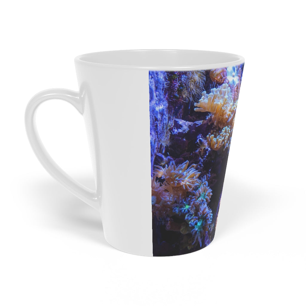 A stylish 12oz Aquarium Latte Mug made of durable white ceramic with a scratch-resistant finish and an easy-grip handle.