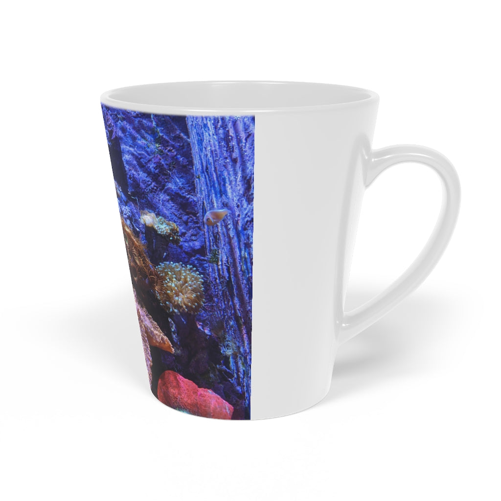 A stylish 12oz Aquarium Latte Mug made of durable white ceramic with a scratch-resistant finish and an easy-grip handle.