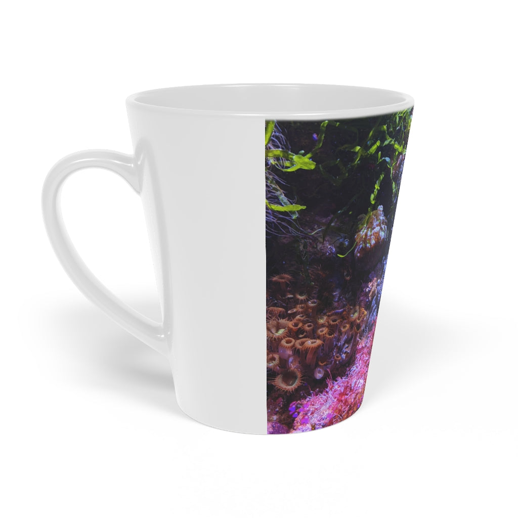 A stylish 12oz Aquarium Latte Mug made of durable white ceramic with a scratch-resistant finish and an easy-grip handle.