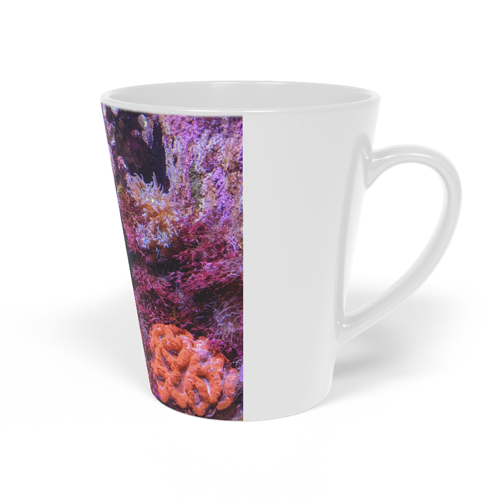 A stylish 12oz Aquarium Latte Mug made of durable white ceramic with a scratch-resistant finish and an easy-grip handle.