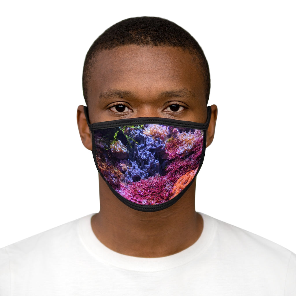 Aquarium Mixed-Fabric Face Mask featuring a vibrant aquarium design with a black outer edge and earloops.