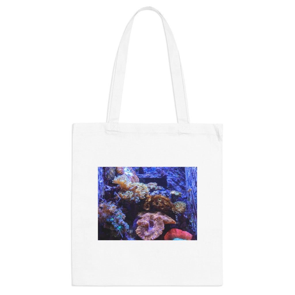 A colorful Aquarium Tote Bag made of 100% cotton with long handles and cross stitching for added stability, perfect for carrying various items.