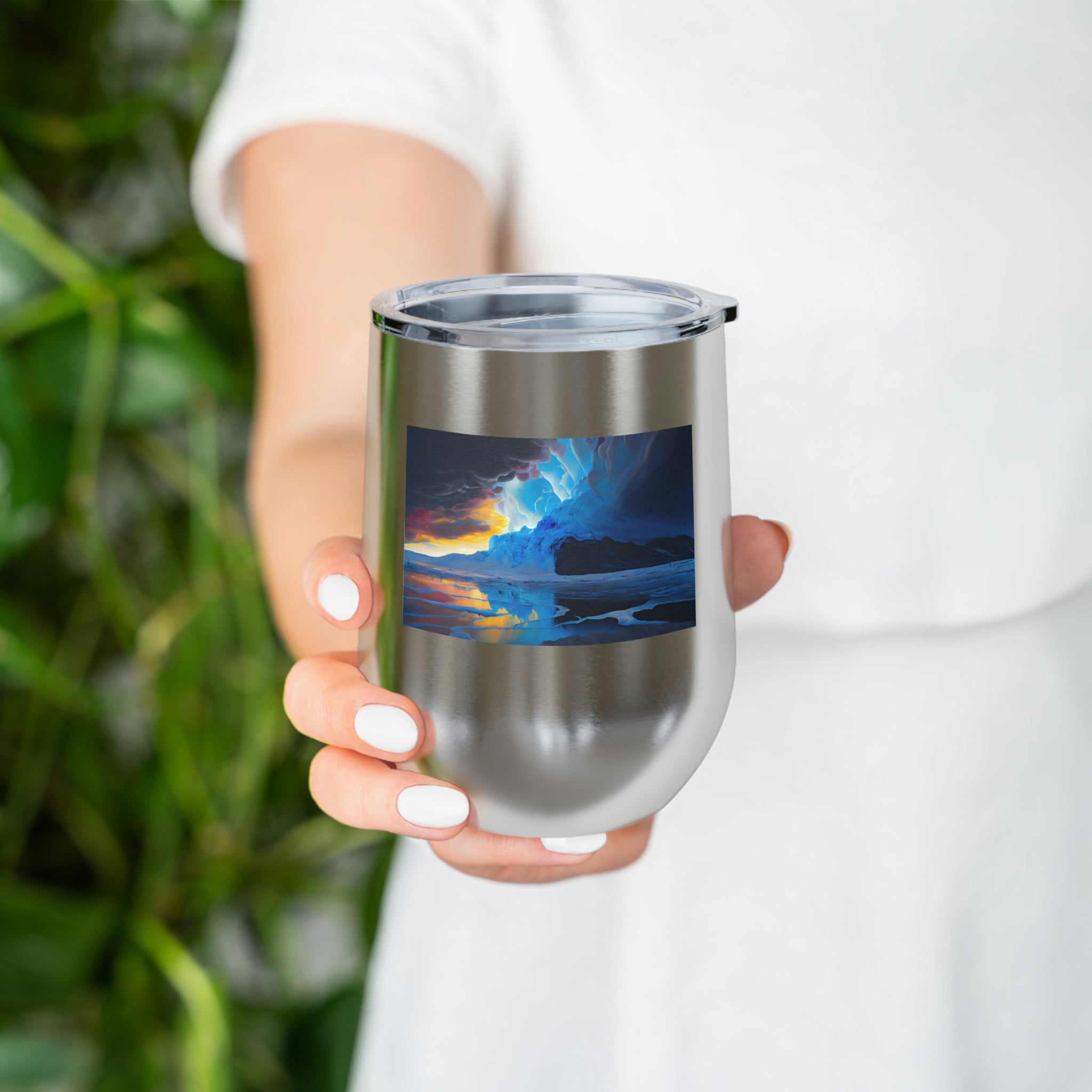 Arctic Wine Tumbler in stainless steel with a clear lid, showcasing its sleek design and double insulation for hot and cold beverages.