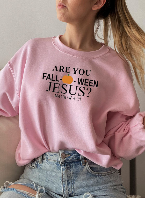 Are You Falloween Jesus Sweat Shirt featuring a cozy fleece design, perfect for fall wear.