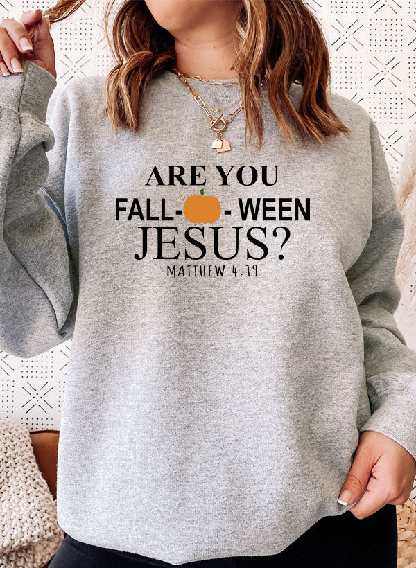 Are You Falloween Jesus Sweat Shirt featuring a cozy fleece design, perfect for fall wear.