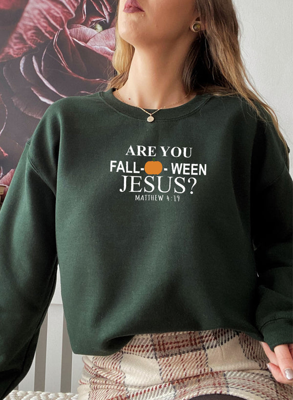 Are You Falloween Jesus Sweat Shirt featuring a cozy fleece design, perfect for fall wear.