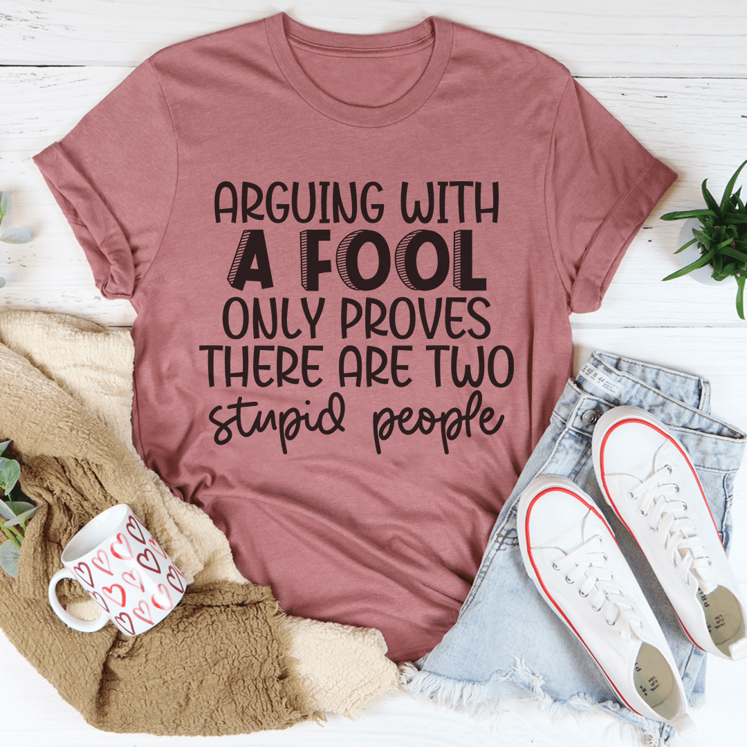 Arguing With A Fool T-Shirt made from soft ring-spun cotton, featuring double stitching for durability and a stylish design.