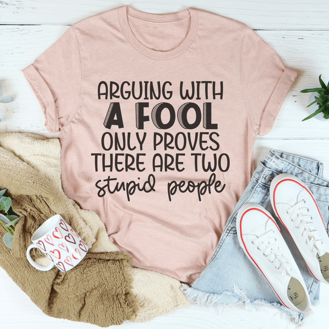 Arguing With A Fool T-Shirt made from soft ring-spun cotton, featuring double stitching for durability and a stylish design.