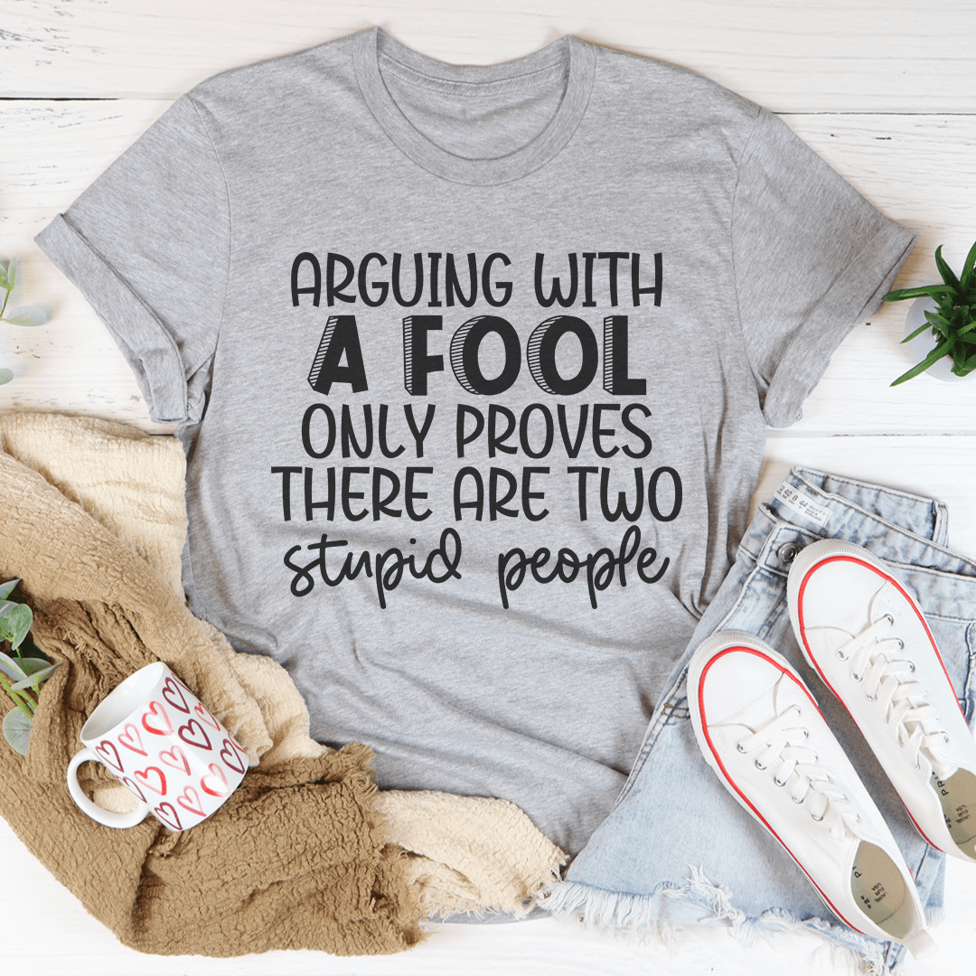 Arguing With A Fool T-Shirt made from soft ring-spun cotton, featuring double stitching for durability and a stylish design.