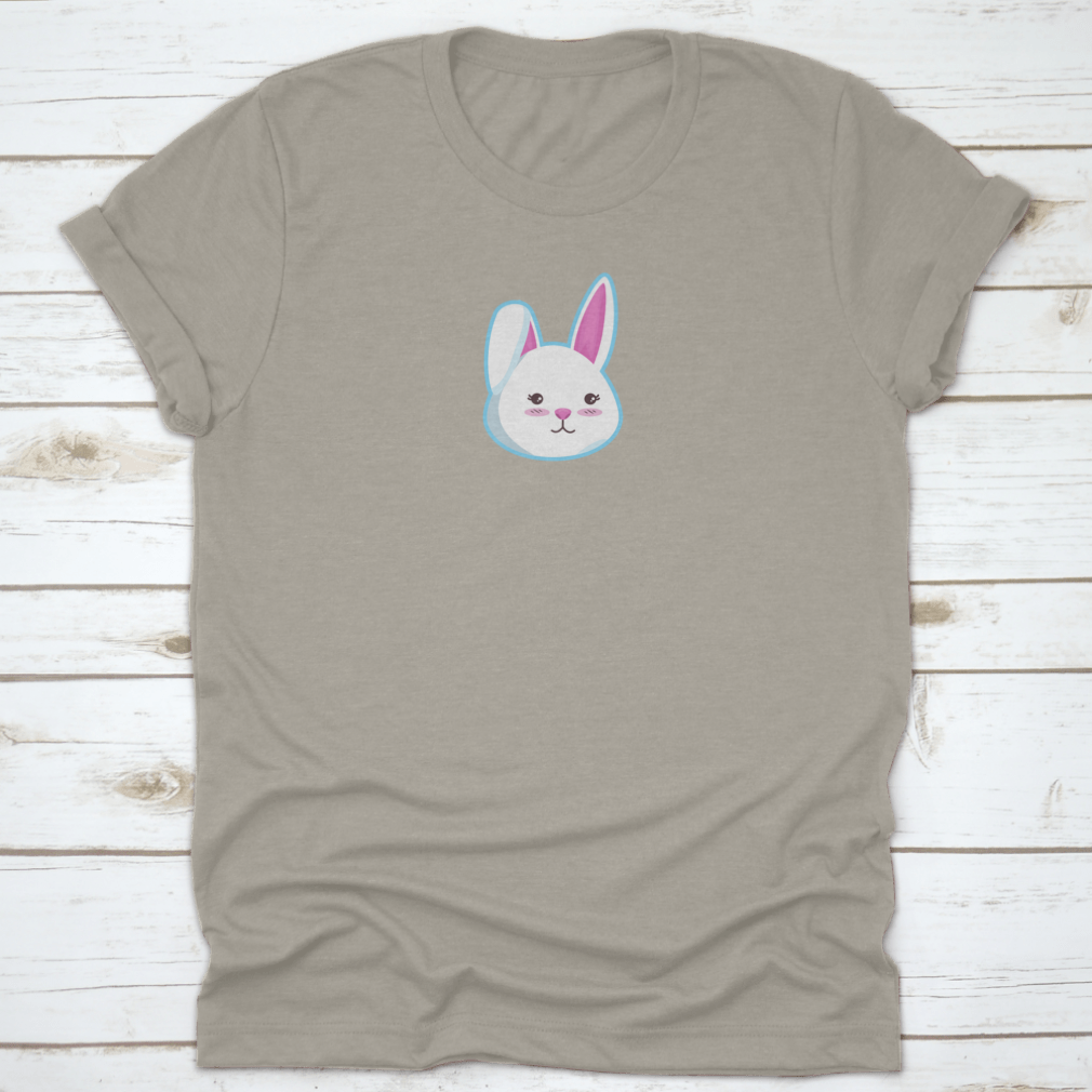 A cute t-shirt featuring a bunny head design with the right ear closed, made from soft cotton fabric.