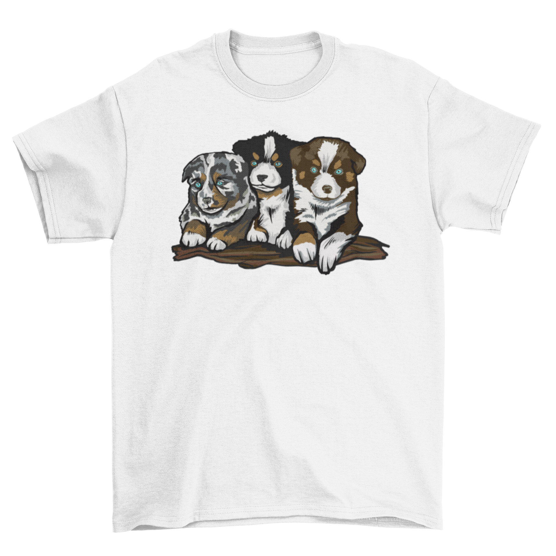 A soft t-shirt featuring three playful Australian Shepherd puppies in a vibrant design.