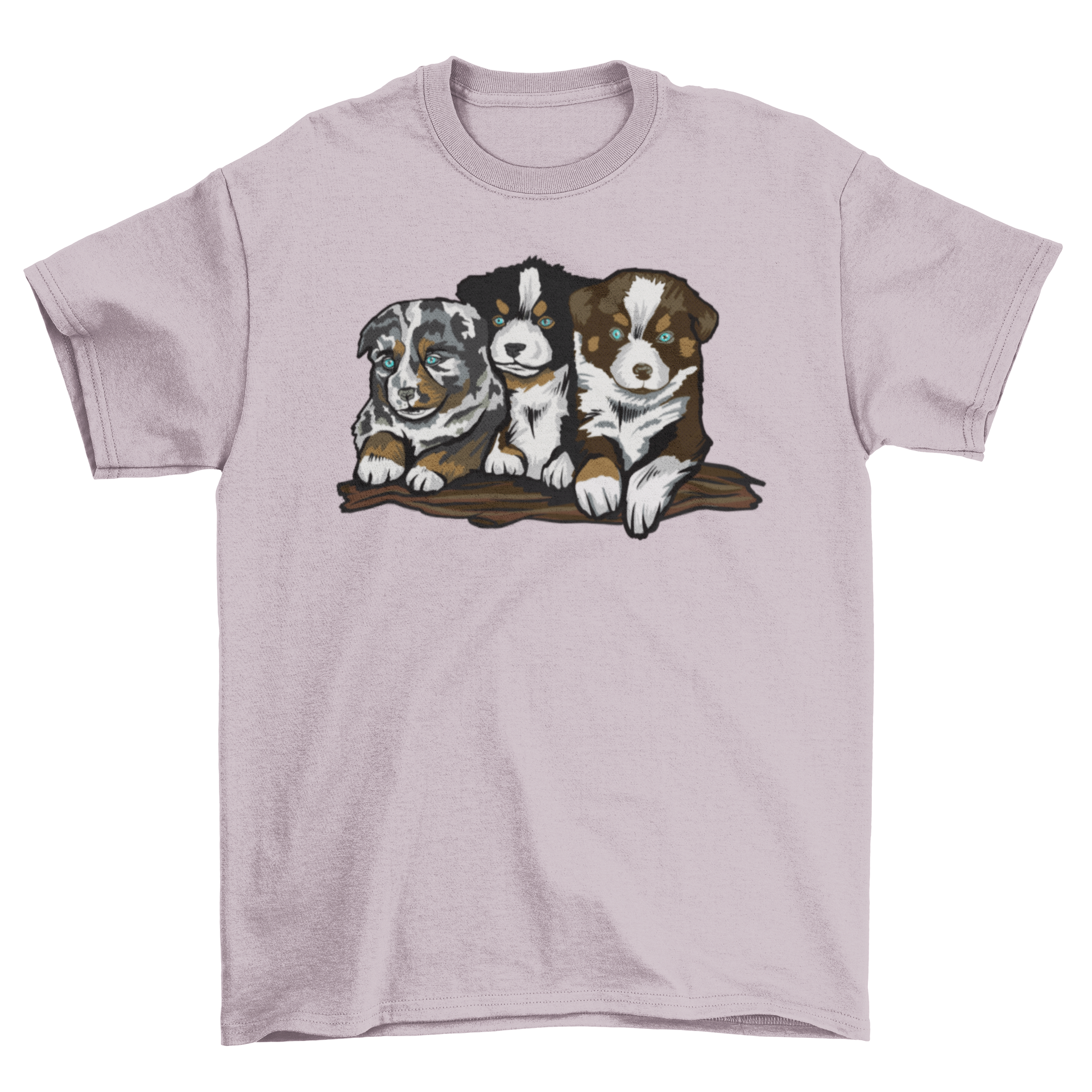 A soft t-shirt featuring three playful Australian Shepherd puppies in a vibrant design.