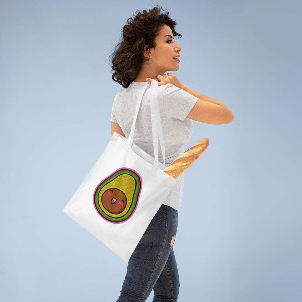 Avocado Tote Bag made of 100% cotton with long handles and cross stitching, available in multiple colors.