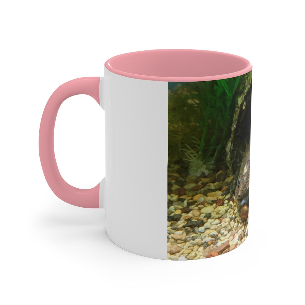 A stylish Axoltl Accent Mug featuring a white exterior with a vibrant colored interior, available in red, pink, and black options.