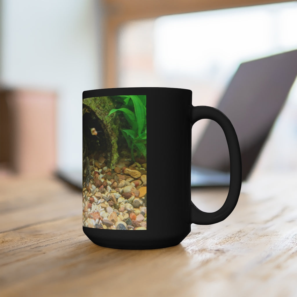 A sleek 15oz black ceramic mug with rounded corners and a C-handle, perfect for coffee and tea lovers.