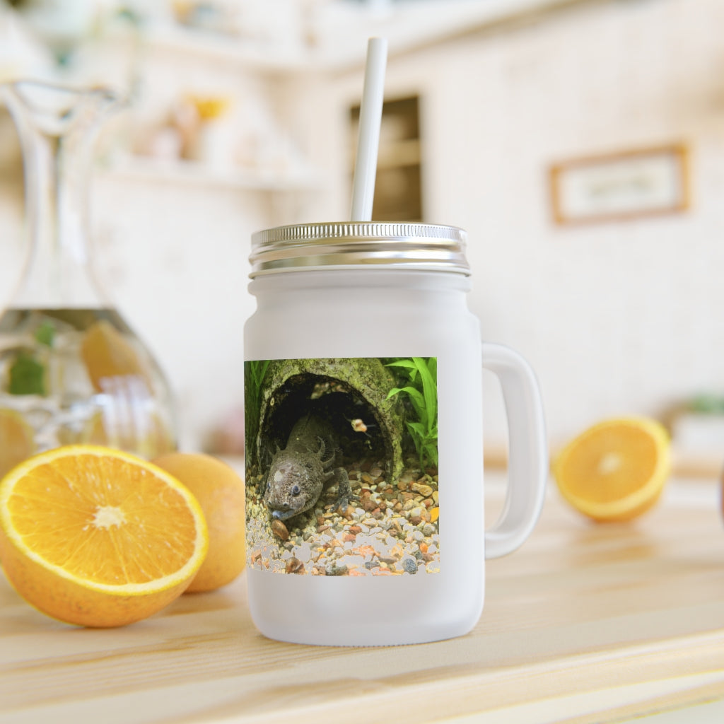 A stylish Axoltl Mason Jar made of frosted glass, featuring a straw and lid, perfect for personalized drinks.