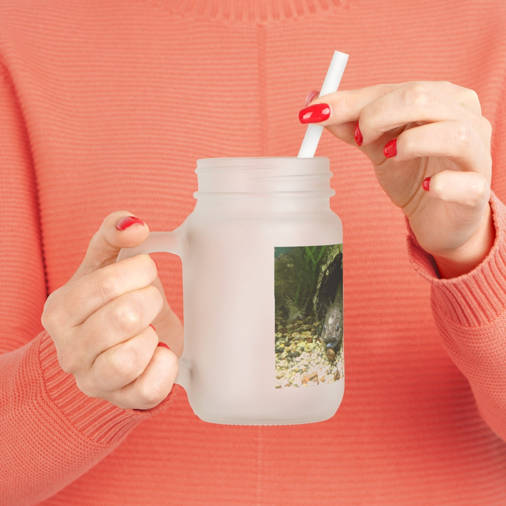 A stylish Axoltl Mason Jar made of frosted glass, featuring a straw and lid, perfect for personalized drinks.