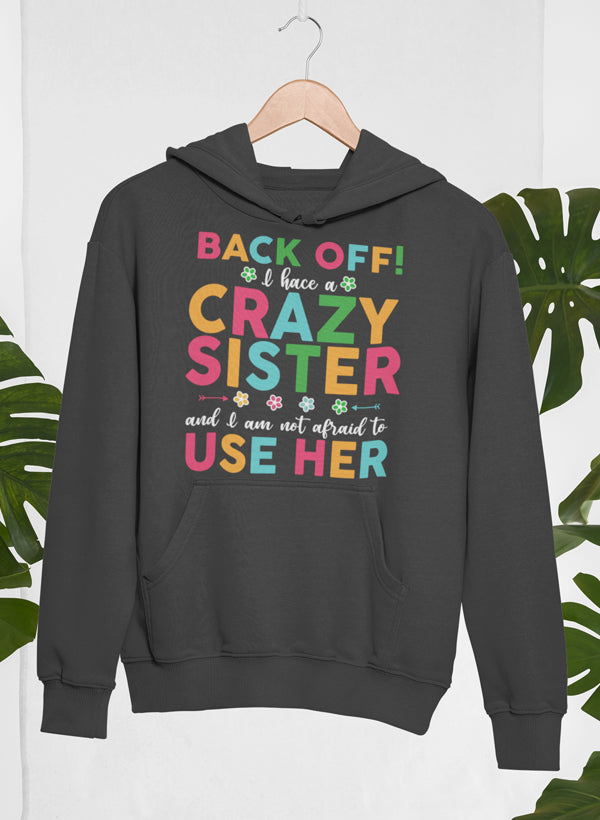 Back Off I Have A Crazy Sister Hoodie featuring a unique design, adjustable hood, and cozy fleece lining.