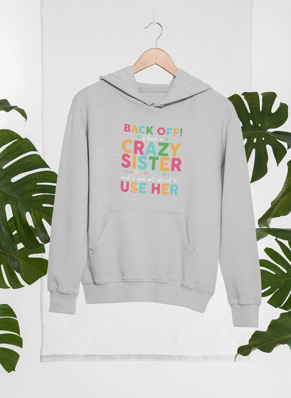 Back Off I Have A Crazy Sister Hoodie featuring a unique design, adjustable hood, and cozy fleece lining.