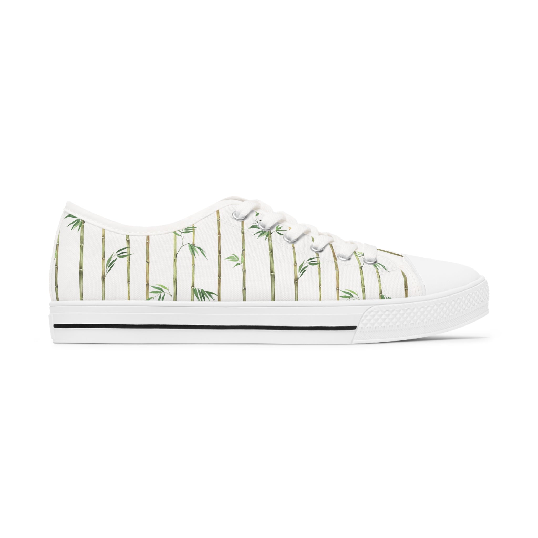 Bamboo Women's Low Top Sneakers in black and white options, showcasing breathable canvas and stylish design with silver metal eyelets.