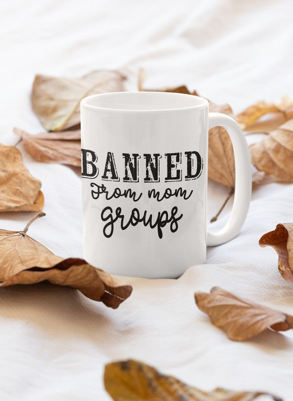 Banned From Mom Group Mug featuring a humorous design, glossy finish, and sturdy handle, perfect for coffee lovers.