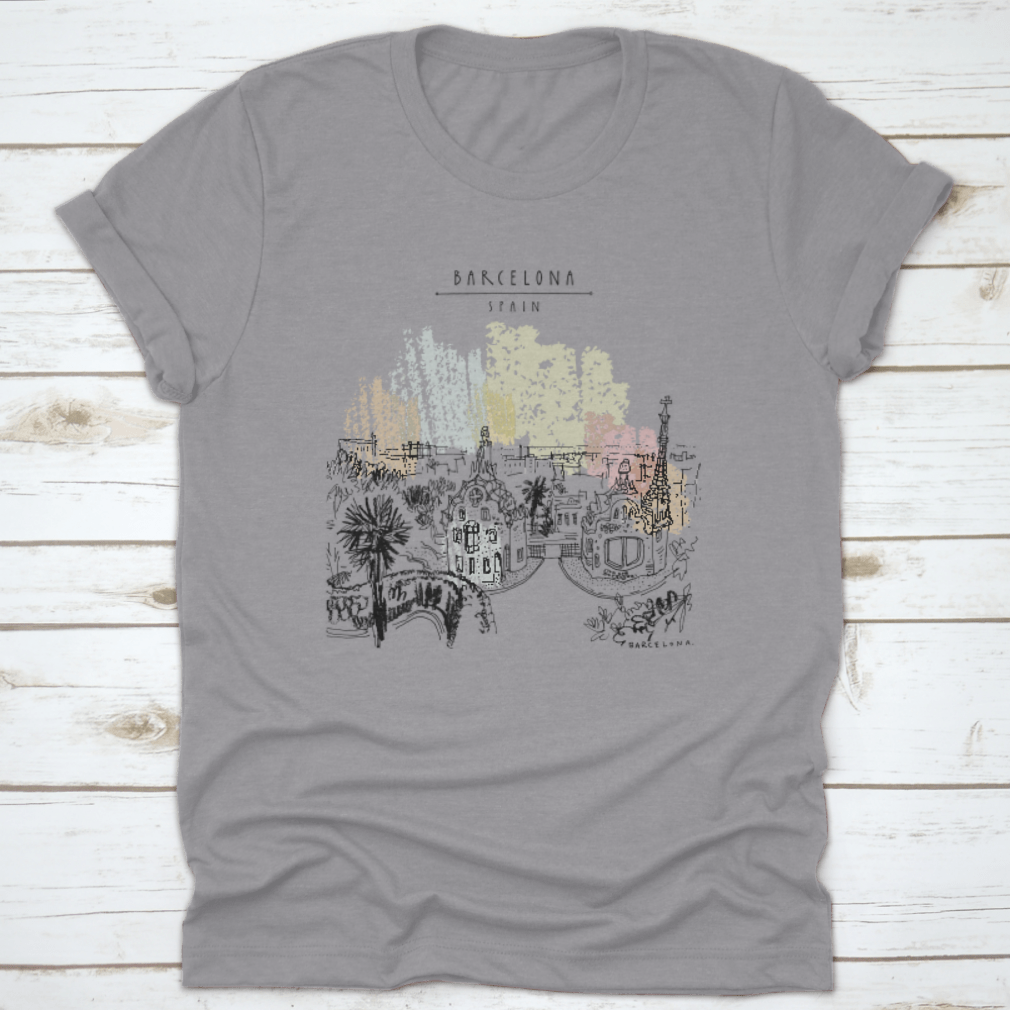 A stylish t-shirt featuring Park Guell and panoramic views of Barcelona, showcasing vibrant colors and a classic fit design.