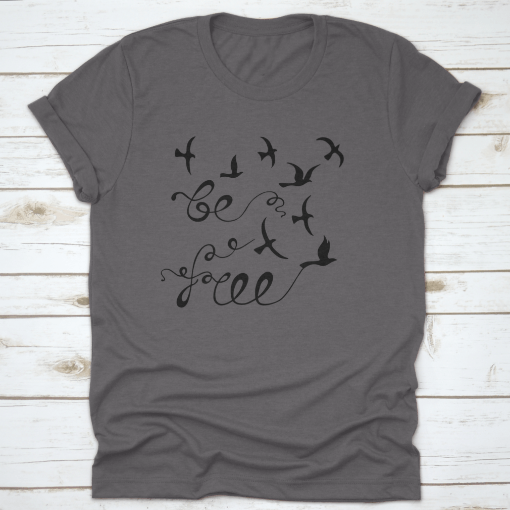 A stylish Be Free Inspirational Quote shirt featuring modern calligraphy on a soft cotton fabric, perfect for casual wear.