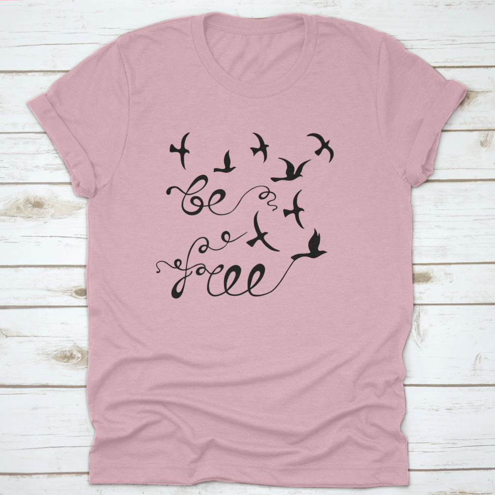 A stylish Be Free Inspirational Quote shirt featuring modern calligraphy on a soft cotton fabric, perfect for casual wear.