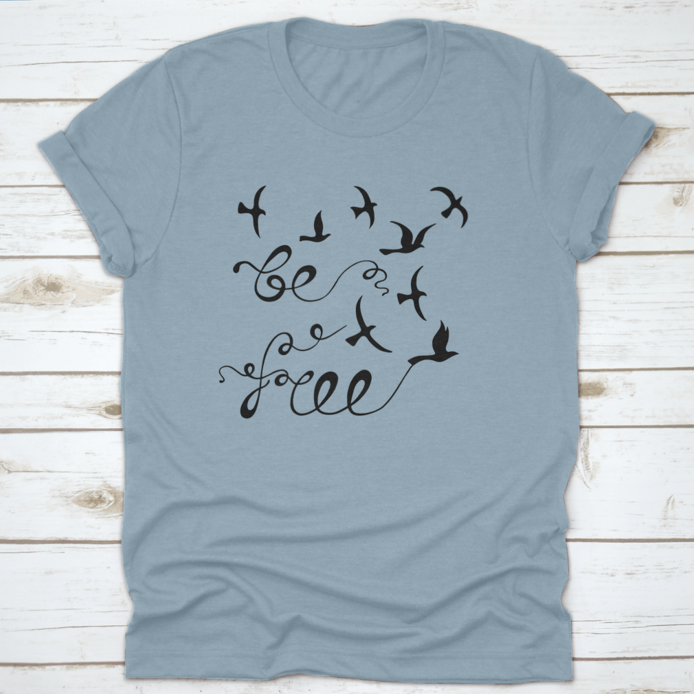 A stylish Be Free Inspirational Quote shirt featuring modern calligraphy on a soft cotton fabric, perfect for casual wear.