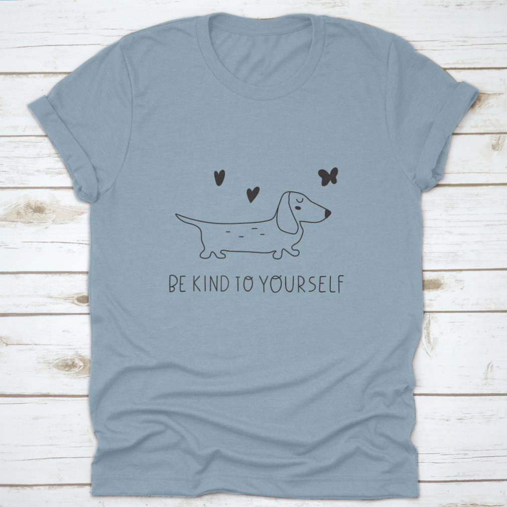 A soft cotton t-shirt featuring an inspirational design that reads 'Be Kind To Yourself', perfect for casual wear.